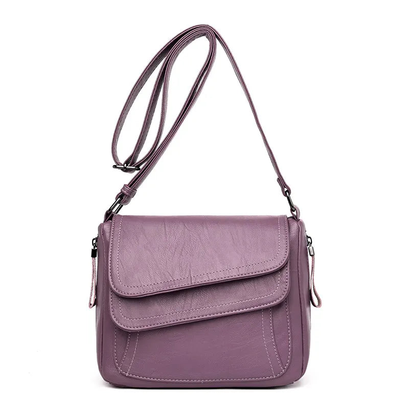 Petit sac bandoulière, design, asymétrique et matière souple ￼