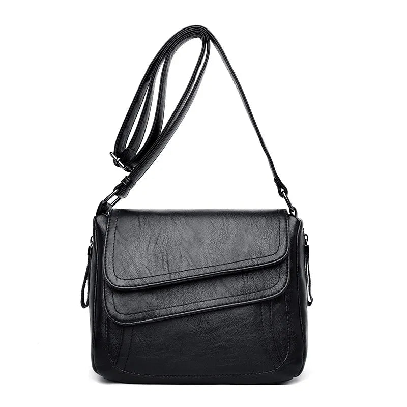Petit sac bandoulière, design, asymétrique et matière souple ￼