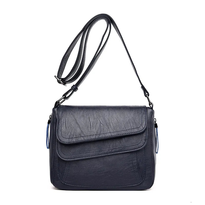 Petit sac bandoulière, design, asymétrique et matière souple ￼