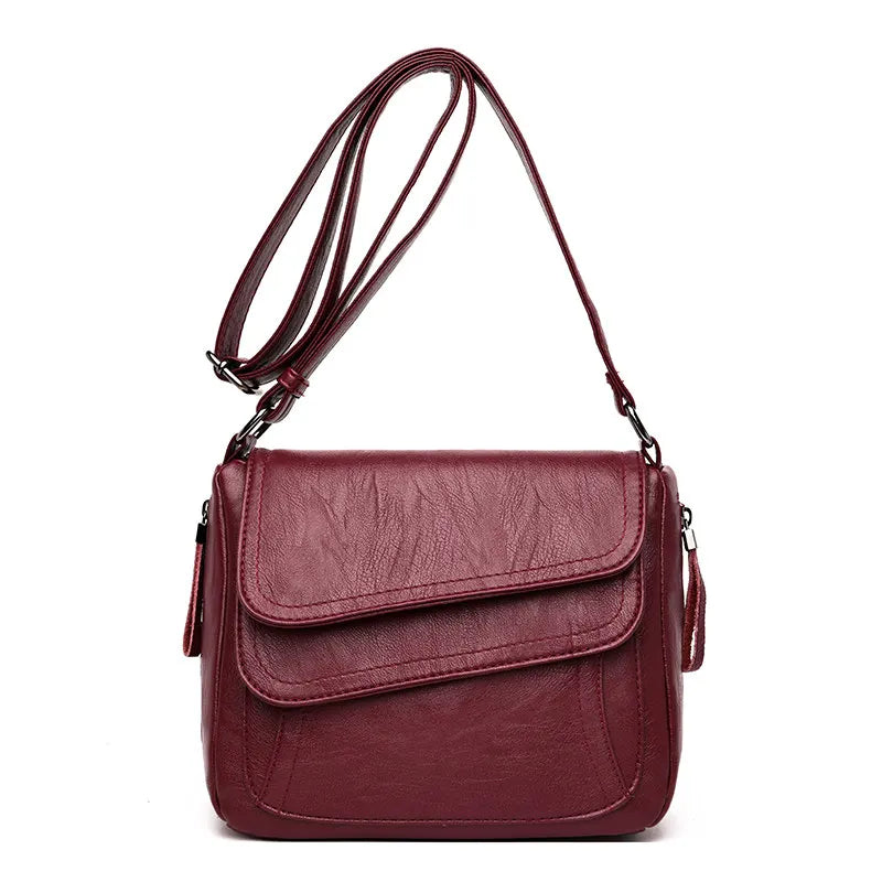 Petit sac bandoulière, design, asymétrique et matière souple ￼