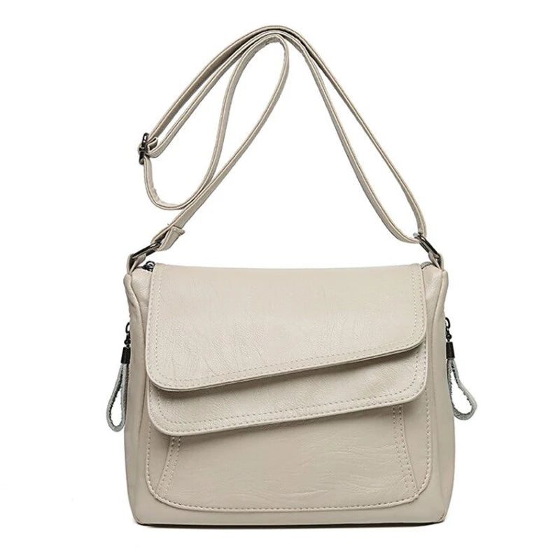 Petit sac bandoulière, design, asymétrique et matière souple ￼